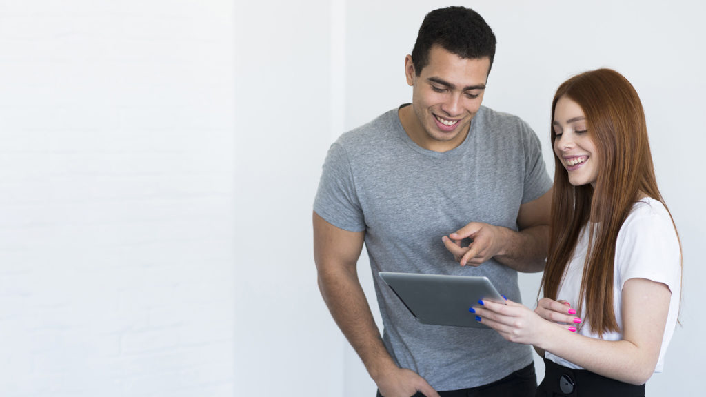 positive young man woman working together